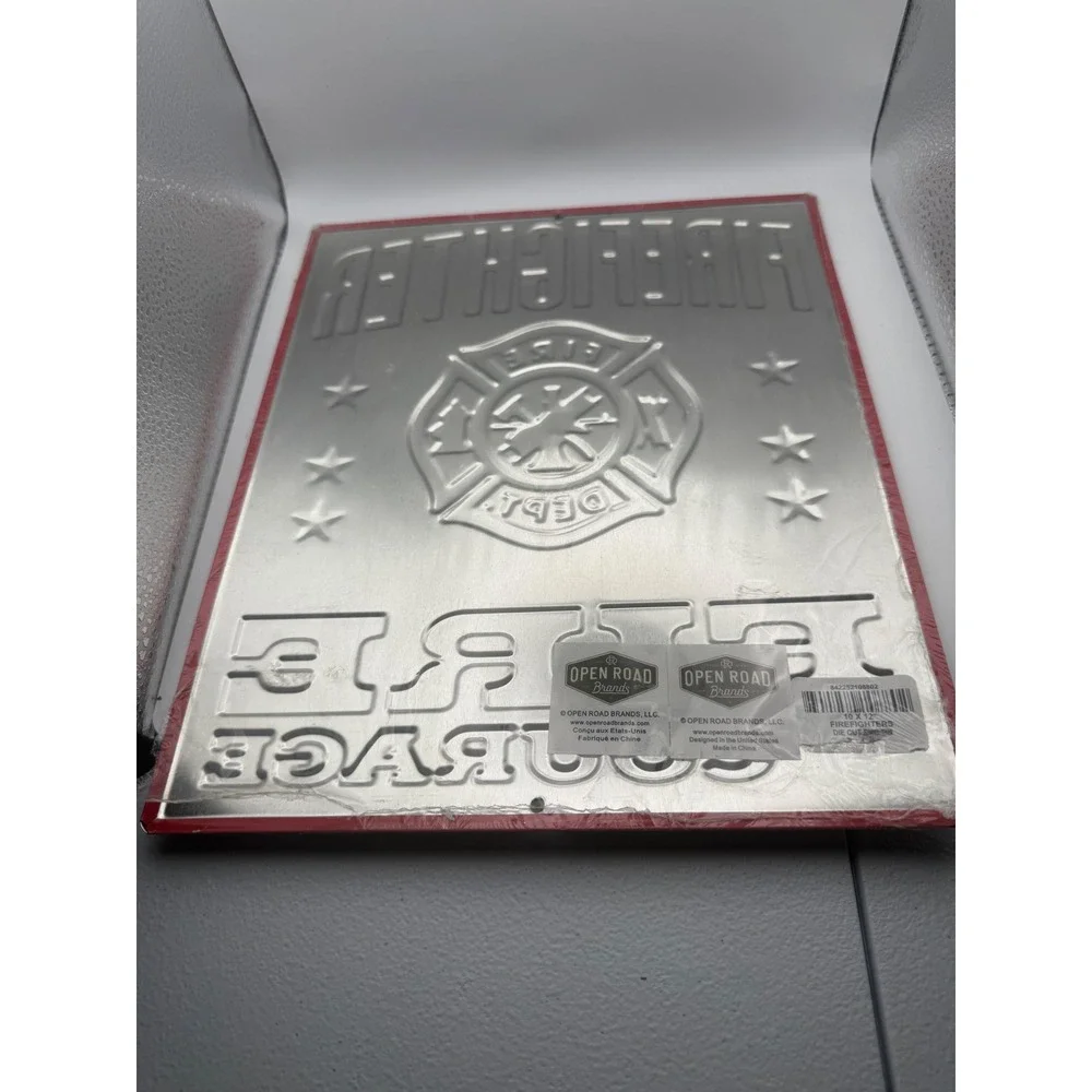 Firefighter Fueled by Fire and Courage Embossed Tin Sign 10x12 Open Road Brands